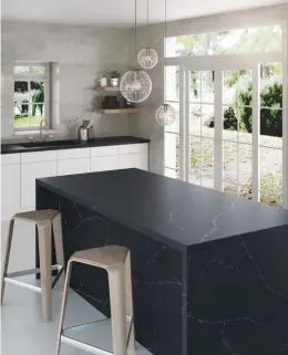  ??  ?? OPPOSITE PAGE: Black, black, black – it is the look these days. Matte, chilled, minimalist black – with just the odd accent of character.THIS PAGE: Cosentino designers suggest looking at something as subtle and sleek as the Silestone bench top material called ‘Indian Black’.