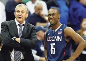  ?? Mel Evans / Associated Press ?? Jim Calhoun, left, and Kemba Walker led UConn to a magical run to the national title 10 years ago this week.