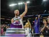  ?? Tribune News Service ?? Sacramento Kings forward Domantas Sabonis (10) reacts after lighting the beam during the Kings win 118-113 over the Oklahoma City Thunder last year at Golden 1 Center in Sacramento.