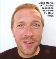  ??  ?? Chris Martin of Coldplay accepting the award for Best Rock