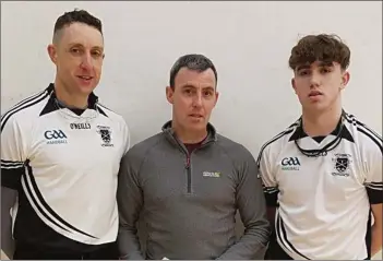  ??  ?? Gavin Buggy (left) and Daniel Kavanagh with Senior singles final referee Tommy Hynes.