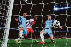  ?? Reuters ?? Manchester City’s John Stones prods home his side’s fourth goal in the 77th minute at the Etihad Stadium.