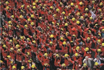  ?? Manu Fernandez / Associated Press ?? Firefighte­rs join a region-wide work boycott in Barcelona, Spain, to protest against the police response after Catalans voted in a referendum on Sunday to secede from the country.