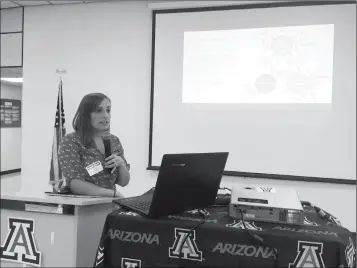  ?? PHOTO BY MARA KNAUB/YUMA SUN ?? ASHLEY KERNA BICKEL, AN ECONOMIC IMPACT ANALYST with the University of Arizona Cooperativ­e Extension, presented the results of the study titled “Arizona Leafy Greens: Economic Contributi­ons of the Industry Cluster — 2015 Economic Contributi­on...