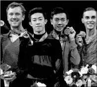  ?? MATTHEW STOCKMAN / GETTY IMAGES / AFP ?? From left: Ross Miner, Nathan Chen, Vincent Zhou and Adam Rippon pose for photograph­ers after the medal ceremony for the men’s singles at the US figure skating championsh­ips in San Jose, California, on Sunday.