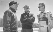  ?? DAVE KALLMANN / MILWAUKEE JOURNAL SENTINEL ?? Ford Chip Ganassi Racing team manager Mike O’Gara (from left) talks with drivers Joey Hand and Dirk Muller during a test at Road America.