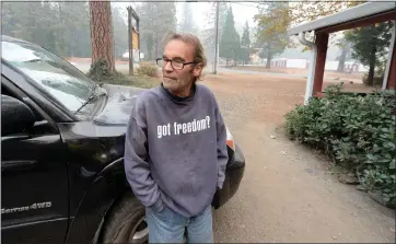  ?? DOUG DURAN — STAFF PHOTOGRAPH­ER ?? John Pohmajevic­h, 60, of Magalia, chose not to evacuate during the Camp Fire. The town of Magalia is one of the small towns in Butte County struggling to pick up the pieces after the devastatin­g wildfire swept through last week.