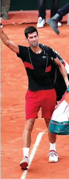  ?? BENOIT TESSIER/REUTER ?? AMBISI: Petenis Serbia Novak Djokovic ketika tampil pada perempat final turnamen Prancis Terbuka 2018 di Roland Garros, Paris (5/6).
