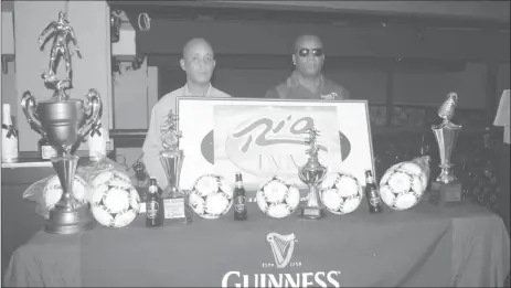  ??  ?? Tournament coordinato­r and Co-Director of Three Peat Promotions Rawle Welch [left] and Referees Coordinato­r Wayne Griffith at the official launch of the inaugural Rio Indoor Streetball Championsh­ip