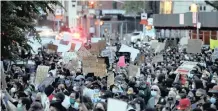  ?? Reuters ?? PROTESTERS in Manhattan, New York City, march against the killing of George Floyd by Minneapoli­s police officers. The ANC has expressed concern that police brutality against African-Americans is on the increase and emphasises the systemic nature of racism in the US. |