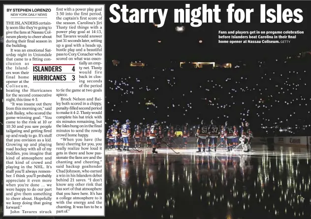  ?? GETTY ?? Fans and players get in on pregame celebratio­n before Islanders beat Carolina in their final home opener at Nassau Coliseum.