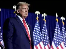  ?? Mike Stewart/Associated Press ?? Republican presidenti­al candidate Donald Trump speaks at a campaign rally Saturday in Rome, Ga.