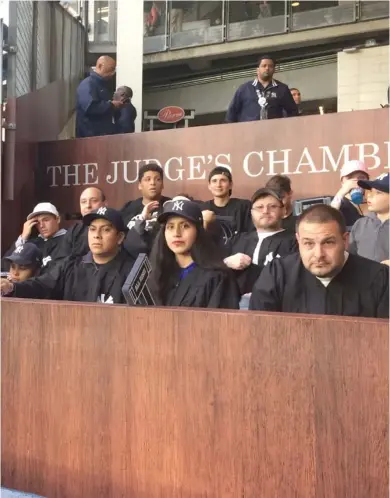  ?? (Photo by Ben Walker, AP) ?? Fans sit in the rooting section for New York Yankees rookie Aaron Judge in an earlier game this season at Yankee Stadium. Looking like a jury box and known as The Judge's Chambers, the section is just behind where Judge plays right field.