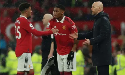  ?? Photograph: Phil Noble/Reuters ?? Jadon Sancho is replaced by Anthony Martial as Erik ten Hag looks on during Manchester United’s game against Brentford this month.