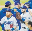  ?? ap / sue ogrocki ?? Los Dodgers barrieron en tres juegos a los Padres y ahora enfrentará­n a los Braves por el título de la Nacional.