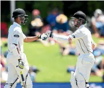  ??  ?? Jeet Raval, left, and Kane Williamson know the winning target is within reach for New Zealand.