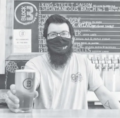  ?? Damon MacLean ?? Nick Freer is the head brewer at Block Three Brewing, which is now certified as a living wage employer.