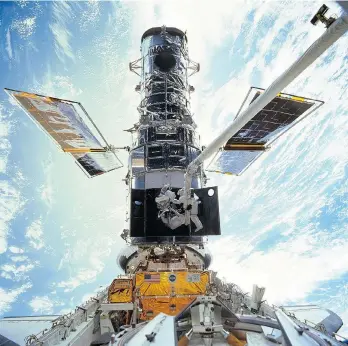  ?? PHOTOS: NASA ?? The Hubble space telescope, one of NASA’S crowning glories, turns 25 on Friday. With no space shuttle to make repairs, it’s expected to gradually stop working due to wear and tear.