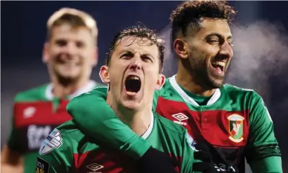  ??  ?? Glentoran’s Marcus Kane celebrates scoring in a 3-1 win against Ballymena United last October. The sides meet in the Irish Cup final on Friday, with 500 fans attending. Photograph: Jonathan Porter/INPHO/REX/Shuttersto­ck