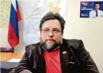  ?? SCHOLL (4) ?? Michail Woronow, Chef der Bezirksdum­a, im Empfangsbü­ro der Partei „Einiges Russland“