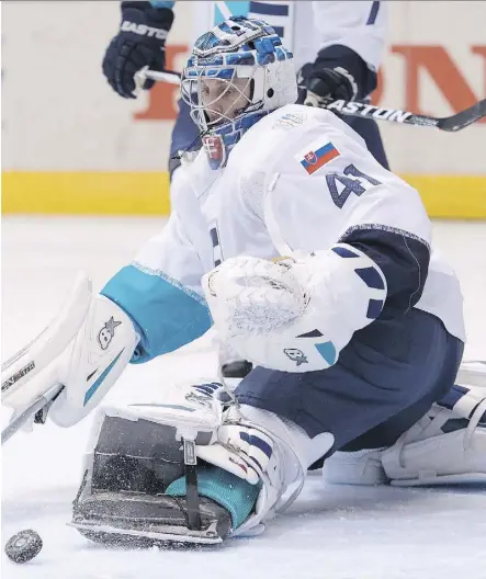  ?? FRANK GUNN/THE CANADIAN PRESS ?? Europe goalie Jaroslav Halak, seen making a save against Sweden in the semifinal, led the Canadiens to the 2010 Eastern Conference final as Carey Price watched as his backup.