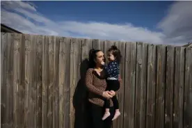  ?? Photograph: Carly Earl/The Guardian ?? Nina Harris and her daughter Mila Pa at the family home in Schofields.