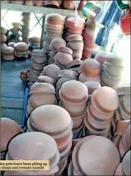  ??  ?? Clay pots have been piling up in shops and remain unsold