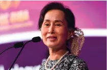 ?? AFP FILE PHOTO ?? STRONG SOUL
Aung San Suu Kyi speaks at a business forum on the sidelines of the 33rd Associatio­n of Southeast Asian Nations summit in Singapore on Nov. 12, 2018.