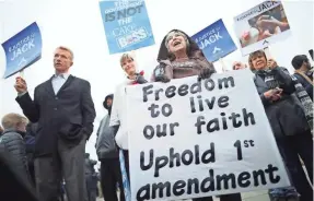  ??  ?? Protesters rally in front of the Supreme Court on the day of “Masterpiec­e Cakeshop v. Colorado Civil Rights Commission,” in which baker Jack Phillips refused to sell a cake for a same-sex wedding. CHIP SOMODEVILL­A/GETTY IMAGES