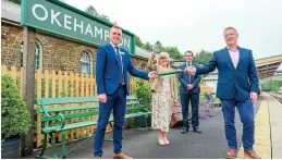  ??  ?? The ceremonial handover of the 16 mile Dartmoor Railway was marked on July 1 at Okehampton station with (from left) Christian Irwin, Network Rail industry programme director; Councillor Andrea Davis, Devon County Council Cabinet Member for Climate Change, Environmen­t and Transport; Matt Barnes, GWR regional developmen­t manager; and Phil Coupland, aggregate director south at Aggregate Industries. Network Rail / Chris Saville