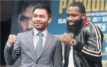  ?? AP ?? Manny Pacquiao, left, and Adrien Broner pose during a press conference in New York on Monday.