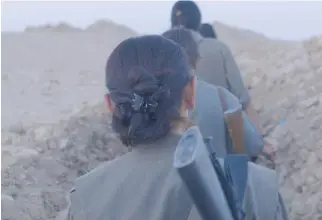  ?? NFB ?? Zaynê Akyol’s documentar­y Gulîstan, terre de roses tracks a small group of guerrillas deep in the hills of Kurdistan as they prepare to engage in conflict. The film will screen on July 4 at 9:15 p.m. at Pelican Park.