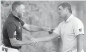  ?? JOHN RAOUX/AP ?? Lee Westwood, left, and Bryson DeChambeau shake hands after DeChambeau’s one-shot win last Sunday at the Arnold Palmer Invitation­al at Bay Hill Club and Lodge.