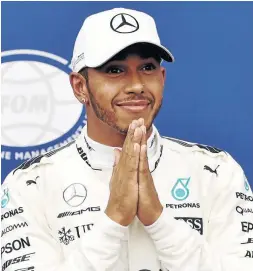  ?? /ANDREJ ISAKOVIC / AFP ?? Mercedes driver Lewis Hamilton is revved up as his bid for a fifth F1 title begins on Sunday.