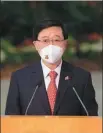  ?? ZOU HONG / CHINA DAILY ?? Hong Kong Chief Executive John Lee Ka-chiu delivers a speech at West Kowloon Station in Hong Kong on Friday.