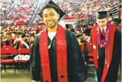  ?? SAN DIEGO STATE ?? DJ Pumphrey is all smiles after graduating from San Diego State with a degree in social science on Friday.