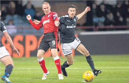  ?? ?? Dundee secured three points as they saw off Rangers at Dens Park to get off the bottom of the Premiershi­p.