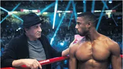  ?? METRO GOLDWYN MAYER PICTURES / WARNER BROS. PICTURES ?? In Creed II, Adonis Creed, right, battles the son of one of Rocky Balboa’s old adversarie­s.