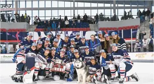  ?? UCONN ?? The UConn women’s hockey team celebrates after Saturday’s win.