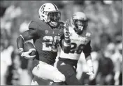  ?? ASSOCIATED PRESS ?? IN THIS SEPT. 30, 2017, file photo, Stanford running back Bryce Love (left) runs for a touchdown past Arizona State defensive back Demonte King (28) during the third quarter of a game in Stanford, Calif.