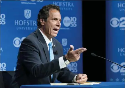  ?? CRAIG RUTTLE — ASSOCIATED PRESS ?? New York Gov. Andrew Cuomo answers a question during Wednesday's gubernator­ial debate at Hofstra University in Hempstead, N.Y.