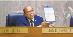  ?? KENNETH K. LAM/BALTIMORE SUN ?? Baltimore County Councilman Julian Jones Jr. talks about the cellphone tax bill.