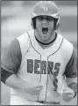  ?? NWA Democrat-Gazette/ANDY SHUPE ?? Spring Hill catcher Josh Winfield celebrates after scoring a run in the first inning.