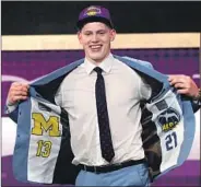  ?? Mike Stobe Getty Images ?? GERMAN Moe Wagner averaged 10.4 points and 4.5 rebounds a game in three seasons at Michigan.