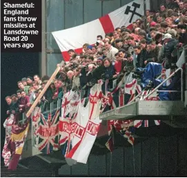  ??  ?? Shameful: England fans throw missiles at Lansdowne Road 20 years ago