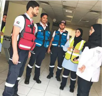  ?? Courtesy: DCAS ?? Faris Bardan with other personnel at the Deira Ambulance Unit in Dubai on Friday.