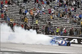  ?? RANDY HOLT / ASSOCIATED PRESS ?? Kyle Larson celebrates after winning a NASCAR Cup Series race at Texas Motor Speedway on Sunday in Fort Worth, Texas.