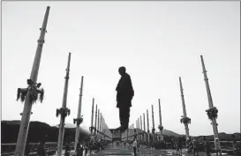  ?? SAM PANTHAKY/GETTY-AFP ?? Statue of Unity, which at 597 feet is the world’s tallest statue, towers over Kevadiya village in Gujarat state. On Wednesday, the bronze figure of Sardar Vallabhbha­i Patel, a key figure in India’s 1947 independen­ce, was dedicated in a ceremony.