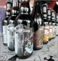  ?? CHUCK BURTON — THE ASSOCIATED PRESS ?? Remaining bottles of Wicked Weed beer are for sale on the bar at Brawley’s Beverage in Charlotte, N.C., Thursday.