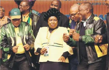  ?? Picture: Gallo Images ?? JOSTLING FOR POWER. President Jacob Zuma, Nkosazana Dlamini-Zuma and Deputy President Cyril Ramaphosa and Zweli Mkhize sing and dance during the ANC’S fifth national policy conference at the Nasrec Expo Centre in July.